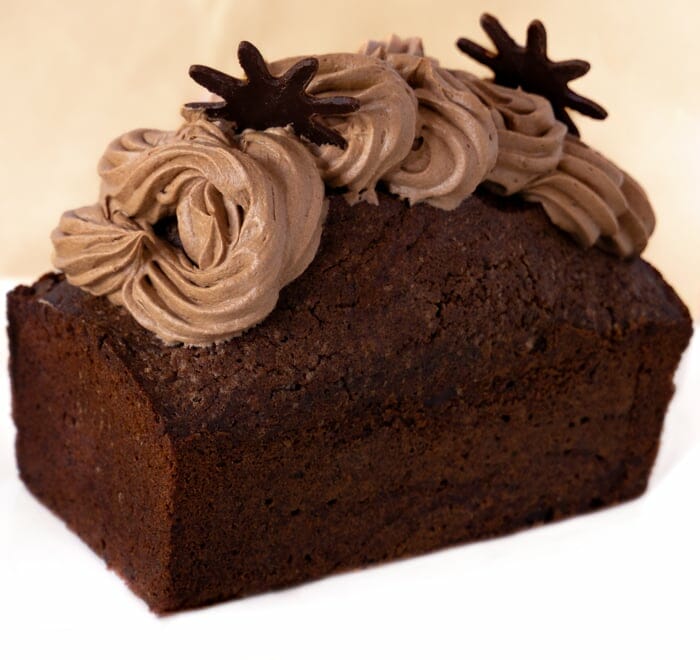 Chocolate pound cake with chocolate frosting as decoration
