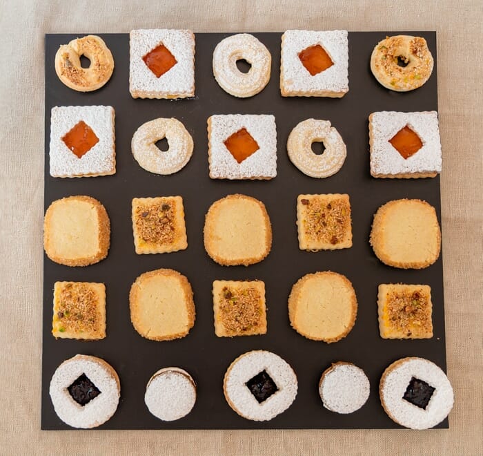Various sable biscuits places on square black base