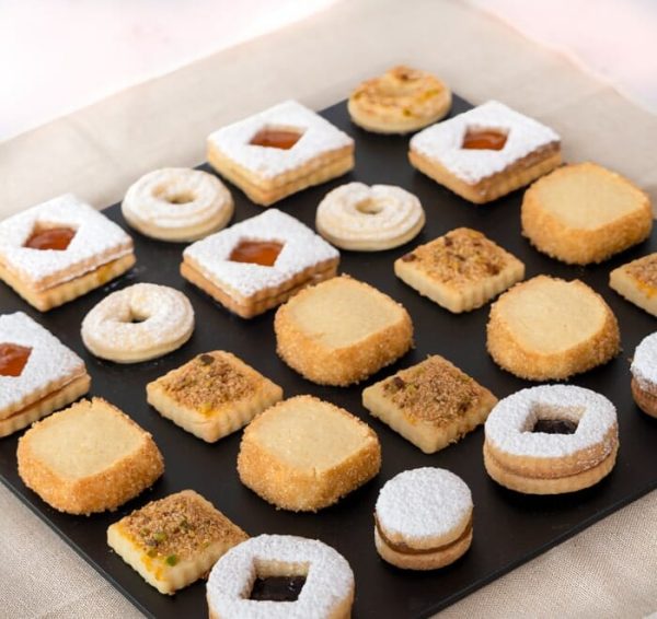 Various sable biscuits places on square black base on a angle