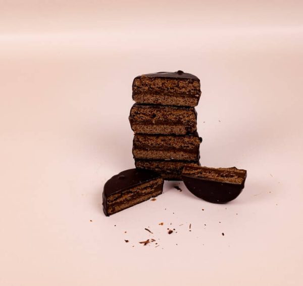 Stack of Chocolate & Dulcle de Leche cut in half to show inside