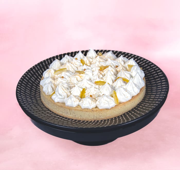 Yuzu Tart with Italian merengue and with candied lemon peels.